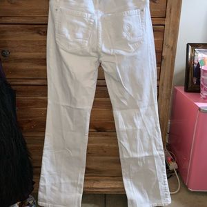 White jeans, slightly boot legged, gently worn